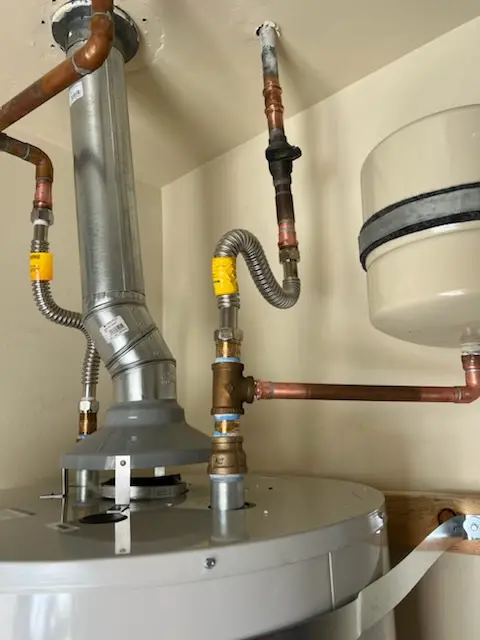 Water heater installation and plumbing repair in Tuttle